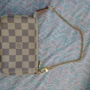 Louis Vuitton clutch handbag